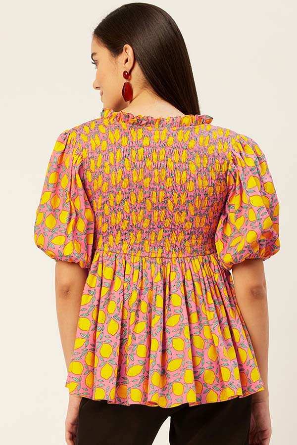 Smocked peplum top