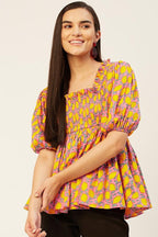 Smocked peplum top