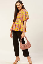 Smocked peplum top