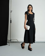 Black polka shoulder knot style dress