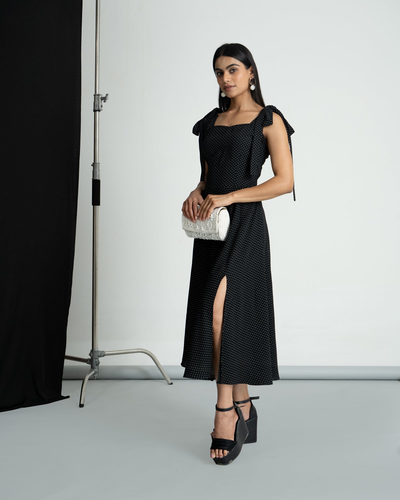 Black polka shoulder knot style dress