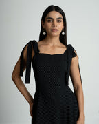 Black polka shoulder knot style dress
